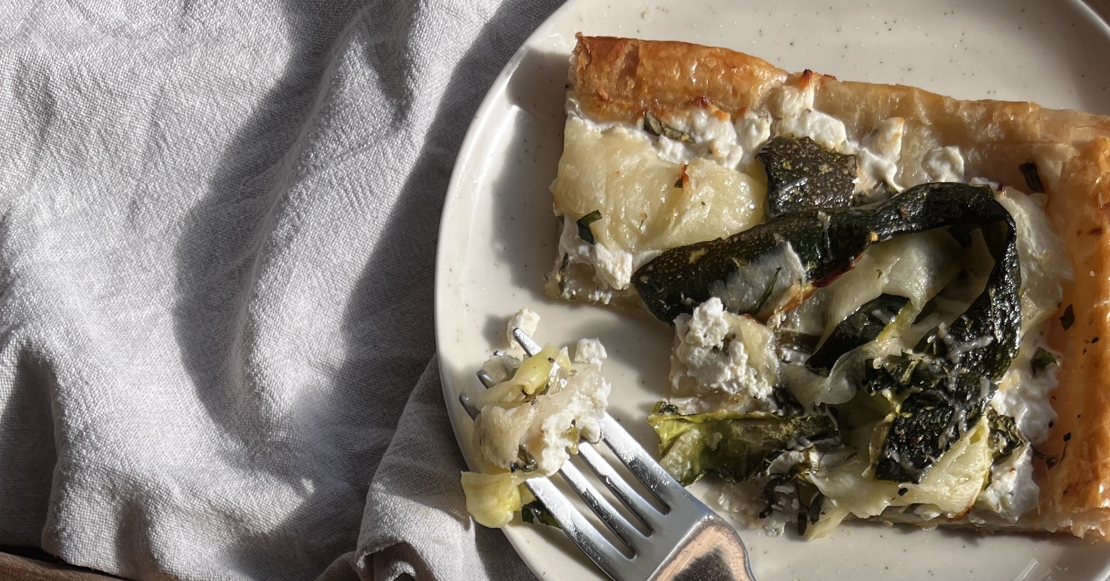 vegetarian puff pastry tart with courgette and cottage cheese